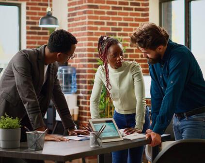 Photo illustrant une jeune équipe en entreprise